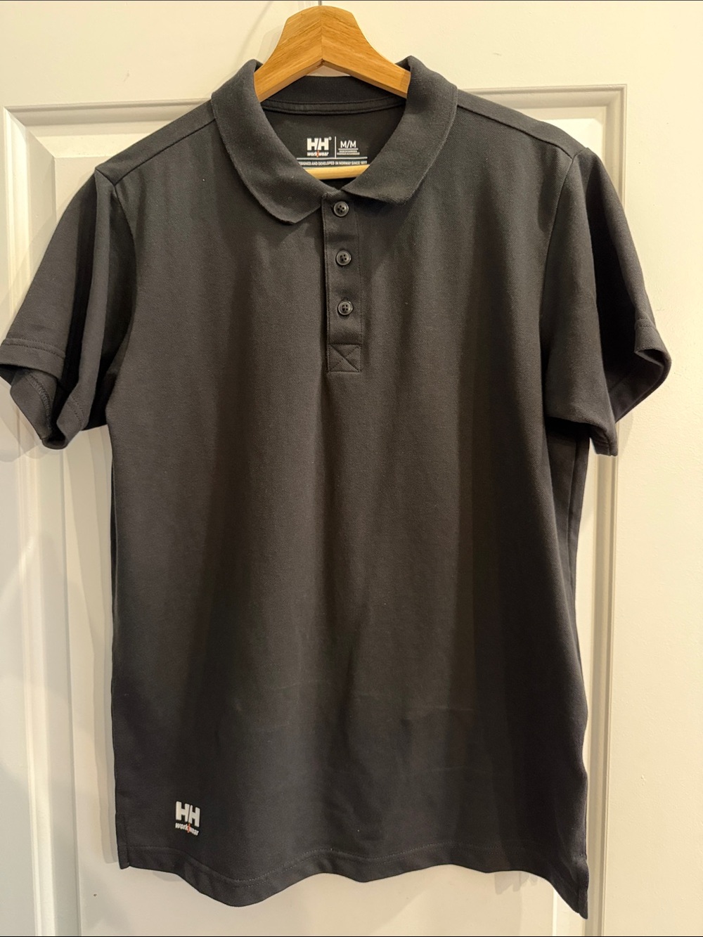 Helly Hansen Men’s Black Polo with Subtle Hem Logo